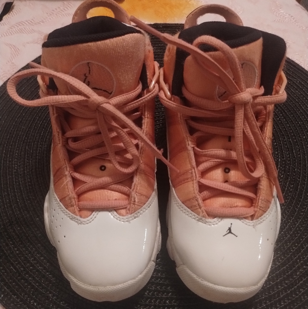 Little girls pink and white Jordans